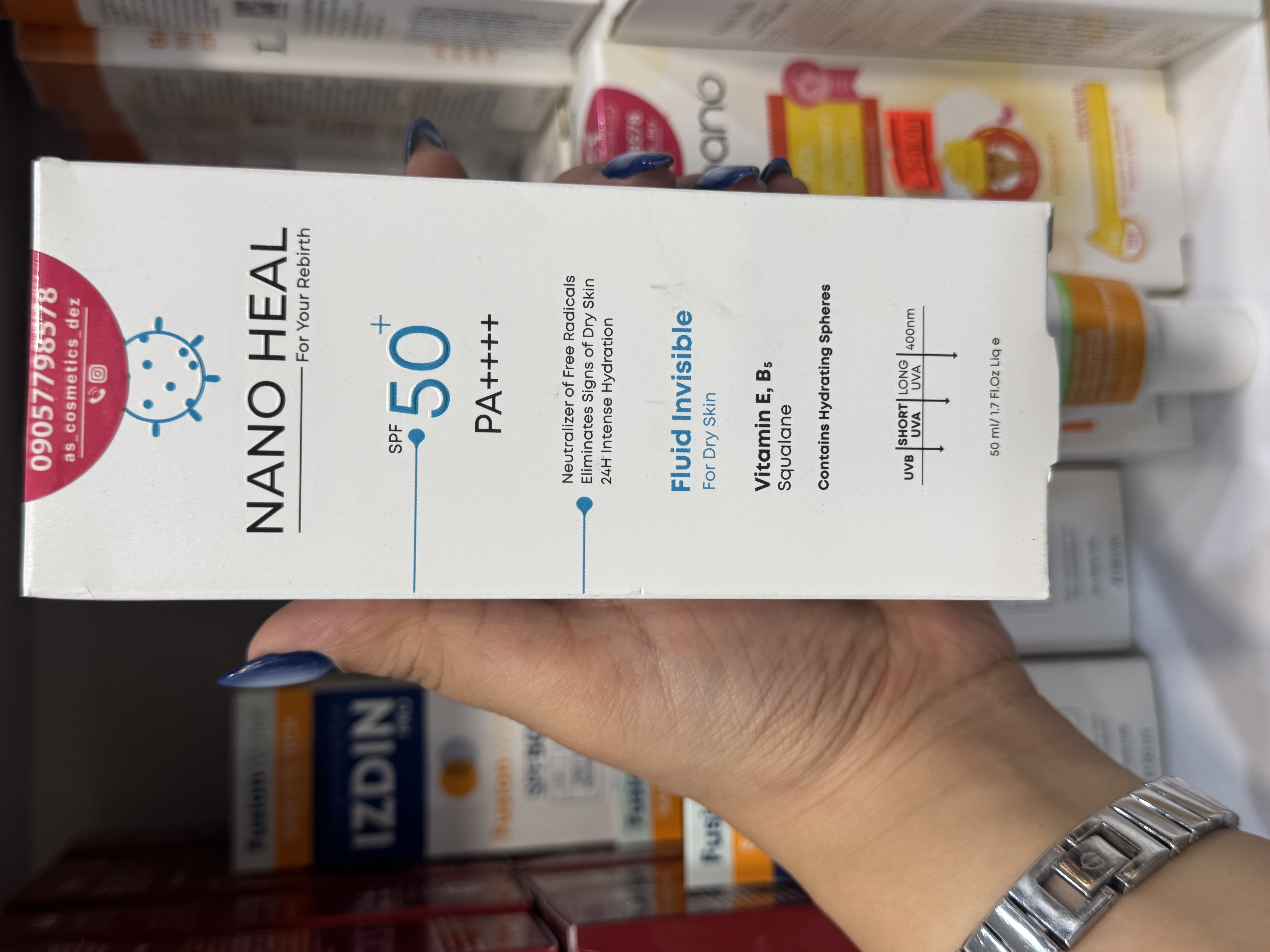 ضد آفتاب فلوئیدی بی رنگ مناسب پوست خشک با SPF50 حجم 50 میلی لیتر نانوهیل ضمانت اصل بودن کالا